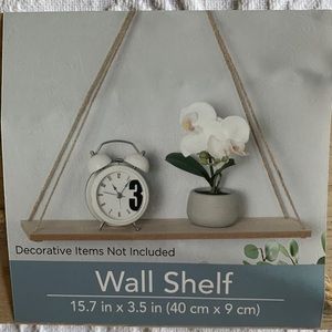 Wall shelf, brand new.